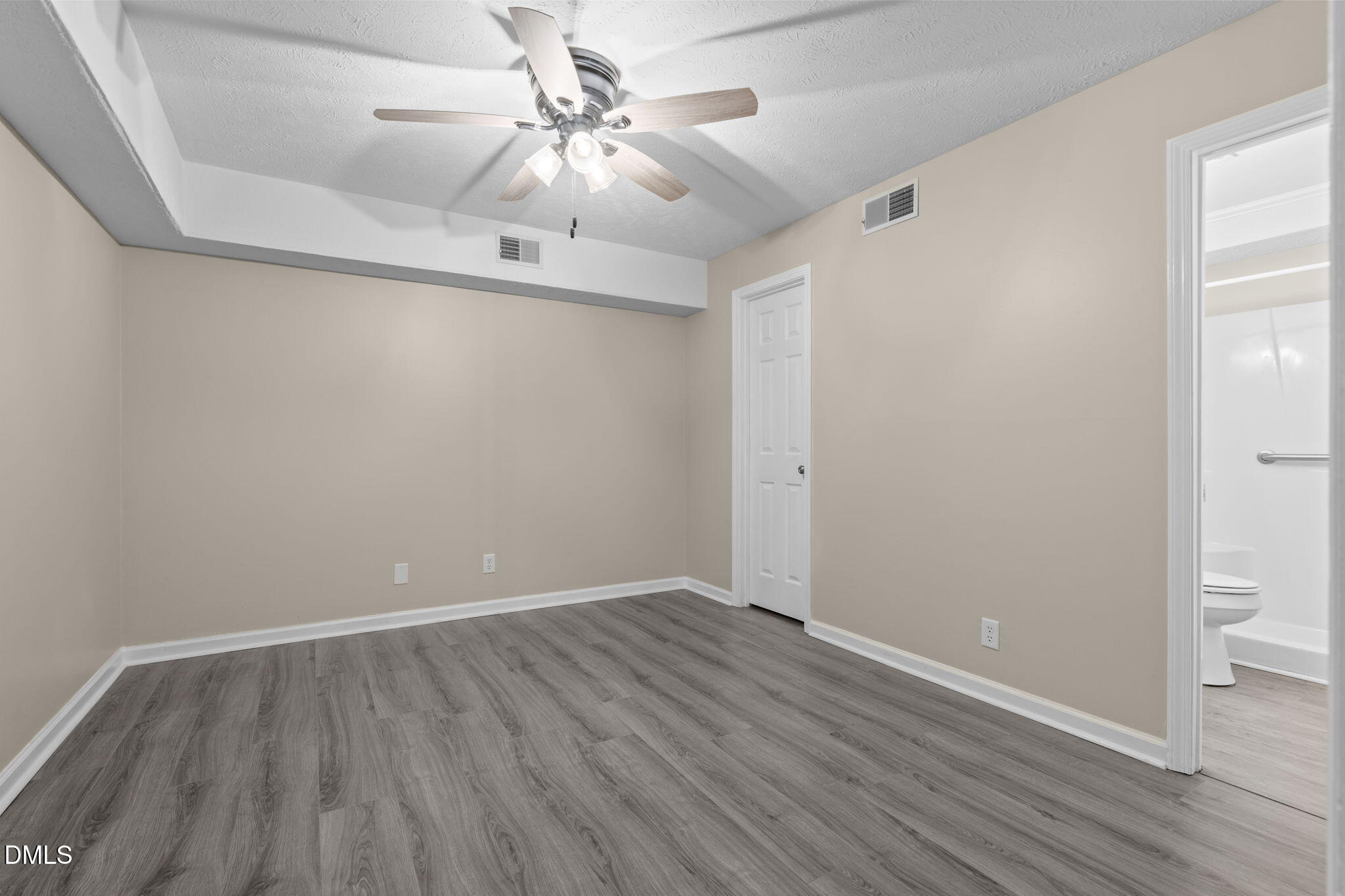 804 West Scotsdale Road Laurinburg, NC 28352 - Photo 24 of 46 wooden floor in an empty room with a window