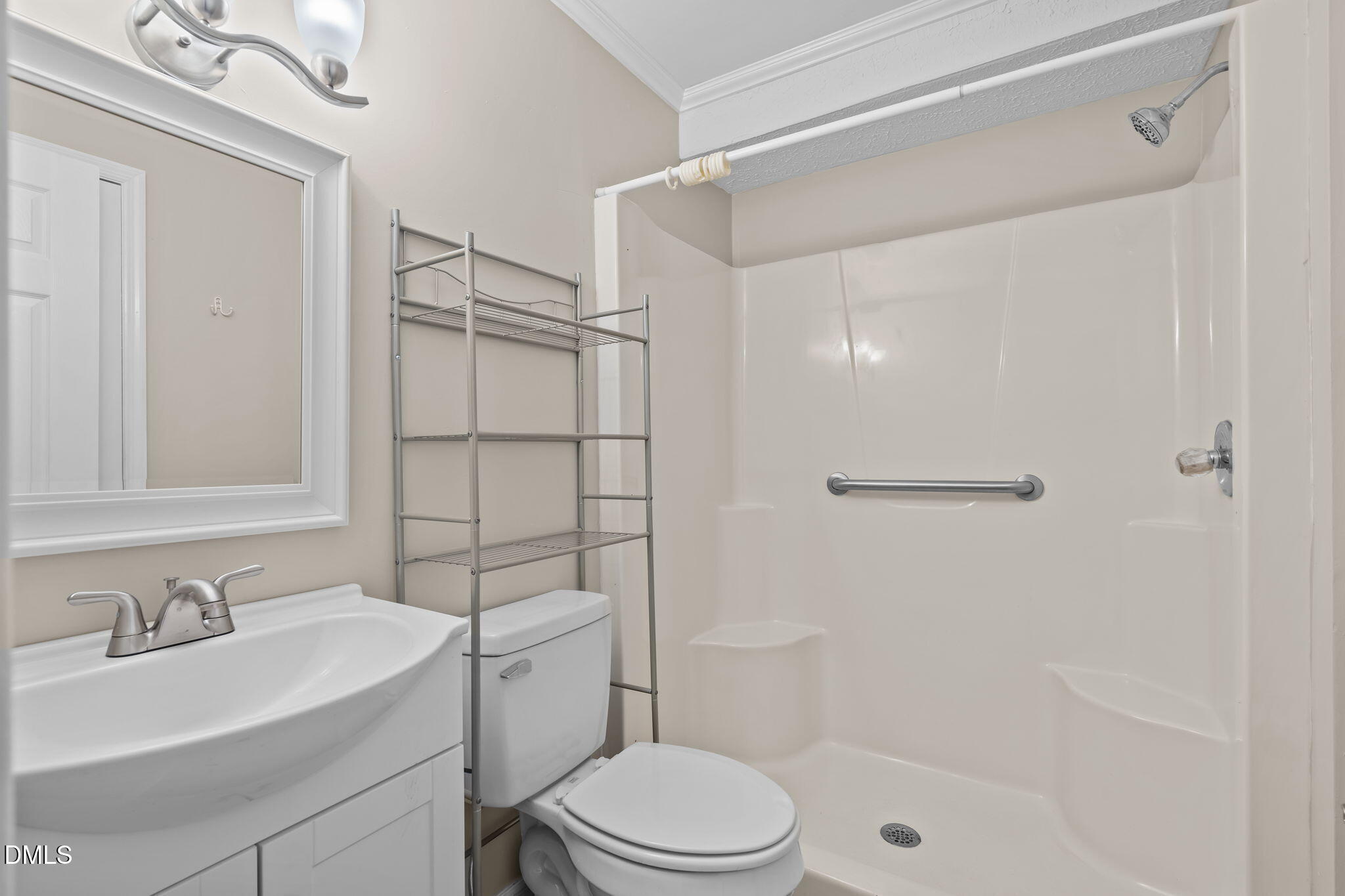 804 West Scotsdale Road Laurinburg, NC 28352 - Photo 30 of 41 a bathroom with a sink toilet and shower