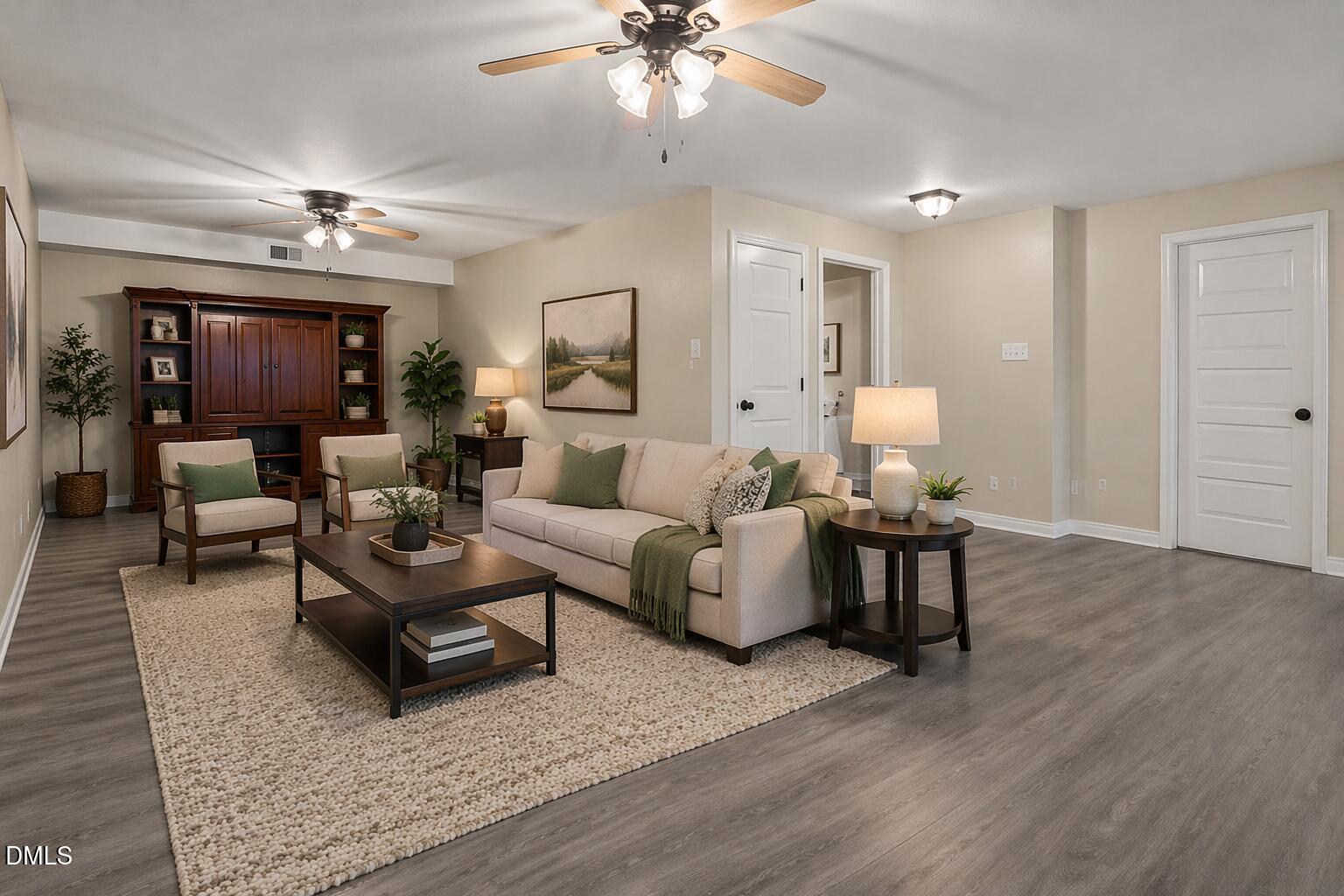 804 West Scotsdale Road Laurinburg, NC 28352 - Photo 33 of 46 a living room with furniture and a wooden floor
