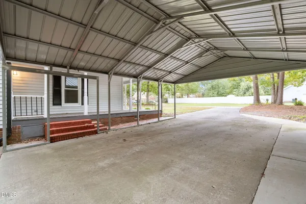 a view of an empty room with a sliding door