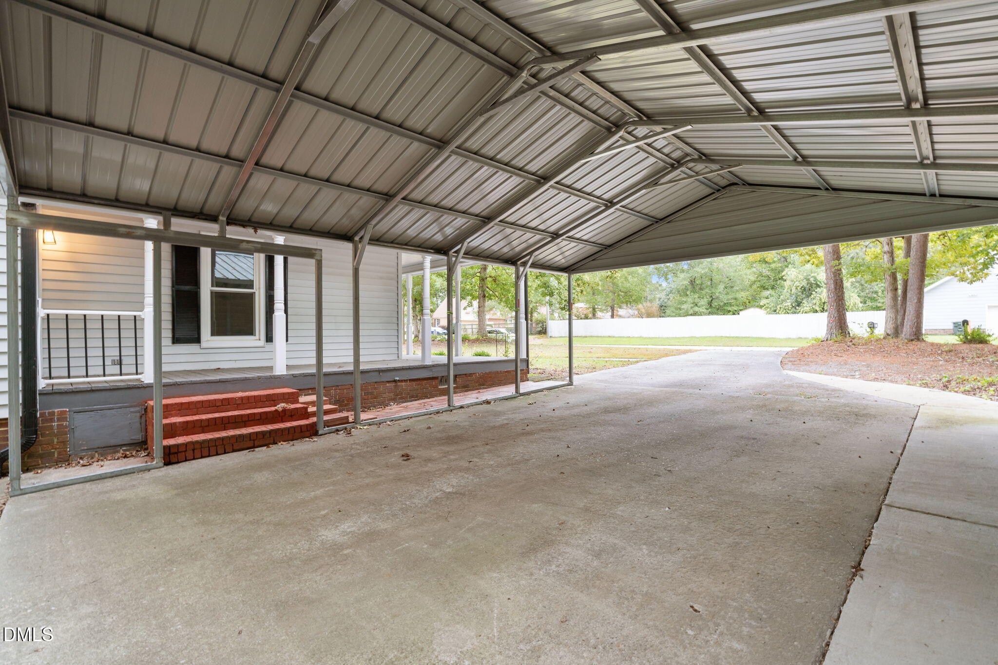 804 West Scotsdale Road Laurinburg, NC 28352 - Photo 37 of 41 a view of an empty room with a sliding door