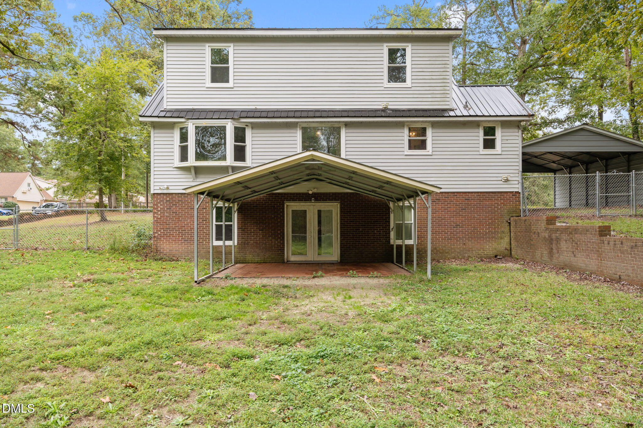 804 West Scotsdale Road Laurinburg, NC 28352 - Photo 40 of 46 a front view of a house with a yard