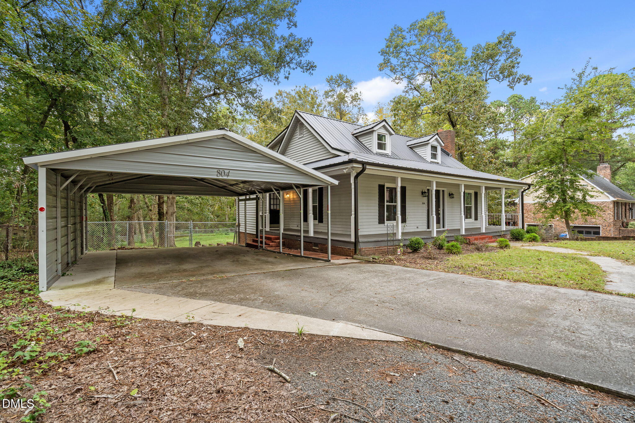 804 West Scotsdale Road Laurinburg, NC 28352 - Photo 45 of 46 a front view of a house with a yard