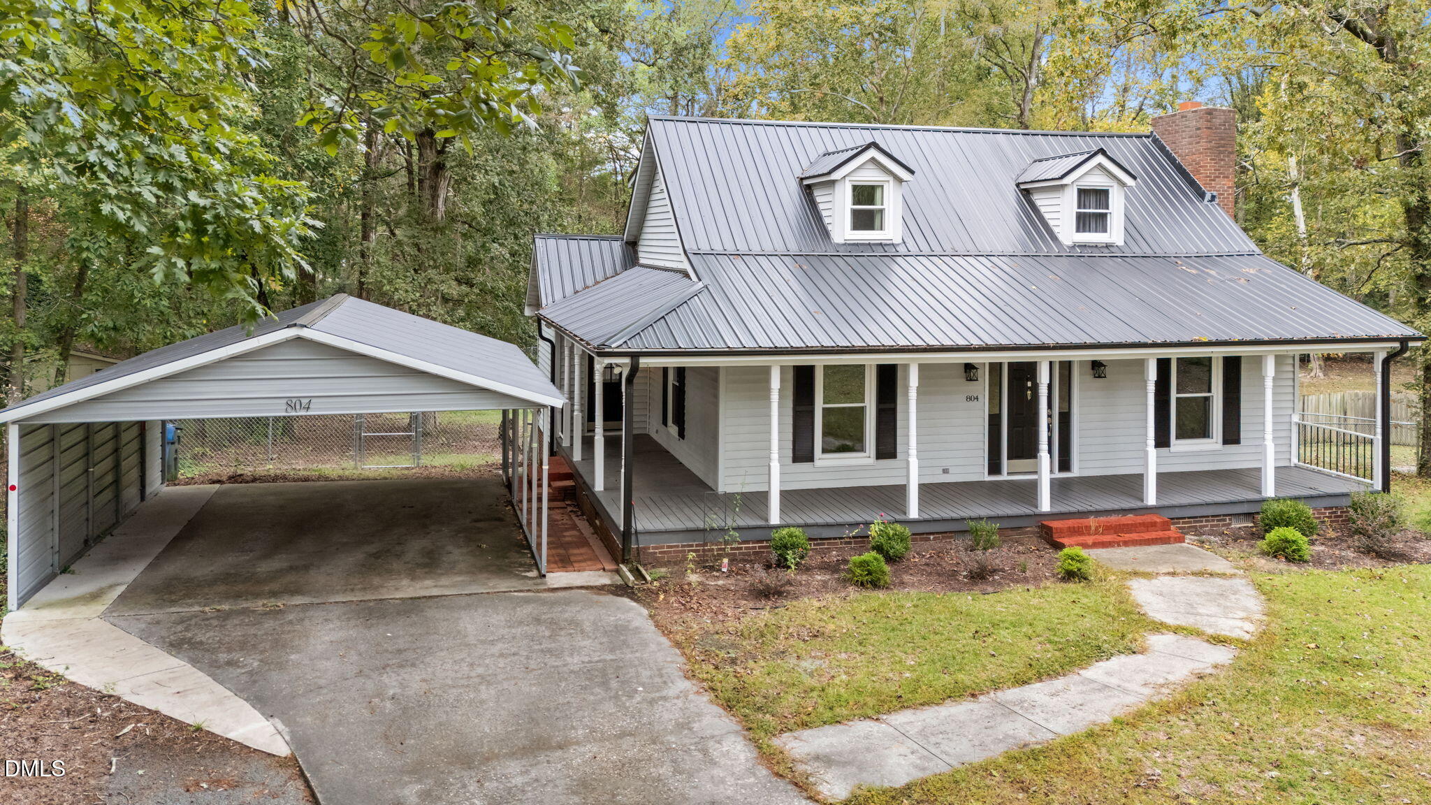 804 West Scotsdale Road Laurinburg, NC 28352 - Photo 46 of 46 a front view of a house with a yard