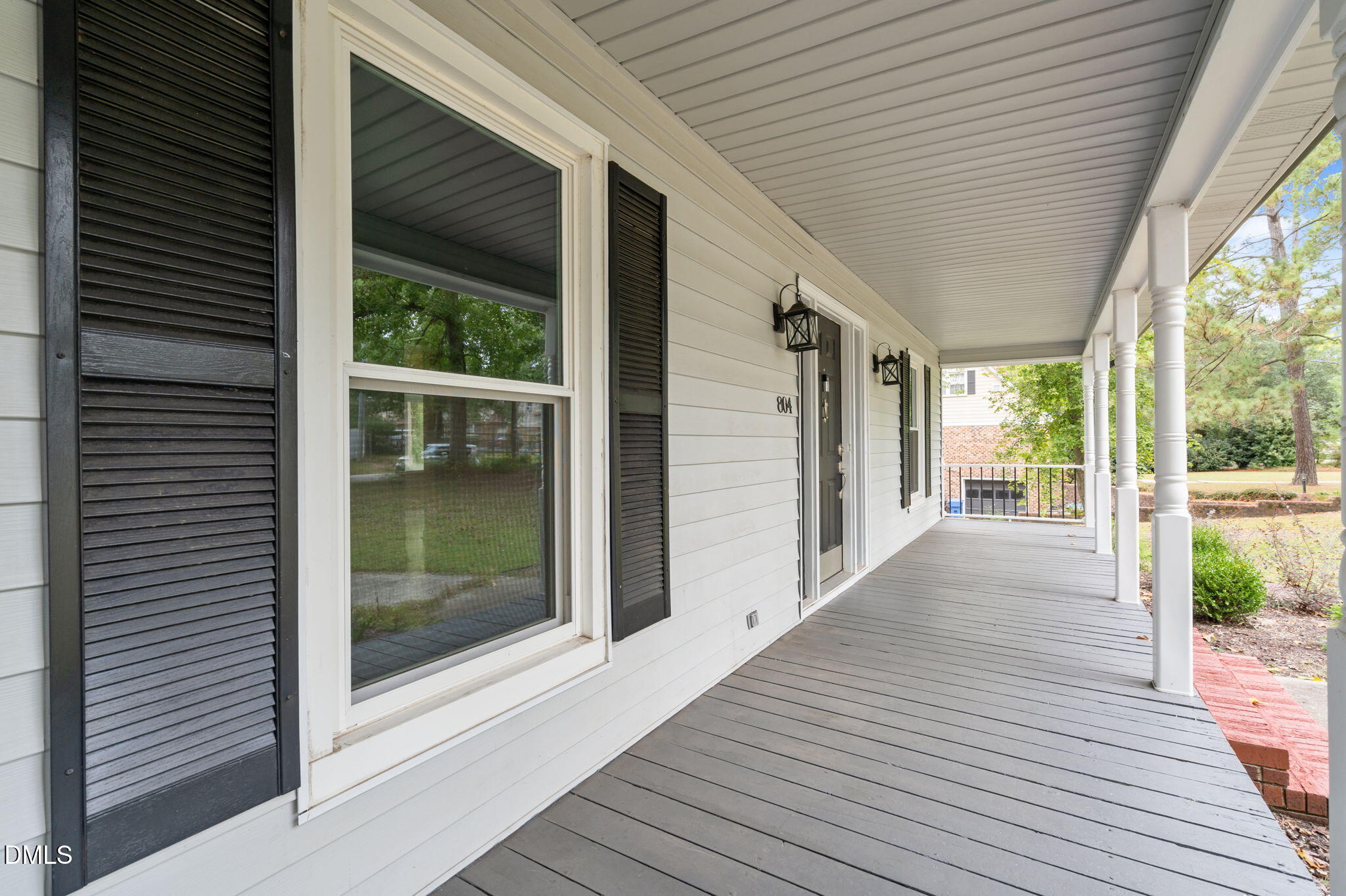 804 West Scotsdale Road Laurinburg, NC 28352 - Photo 5 of 46 a view of backyard with porch and wooden floor