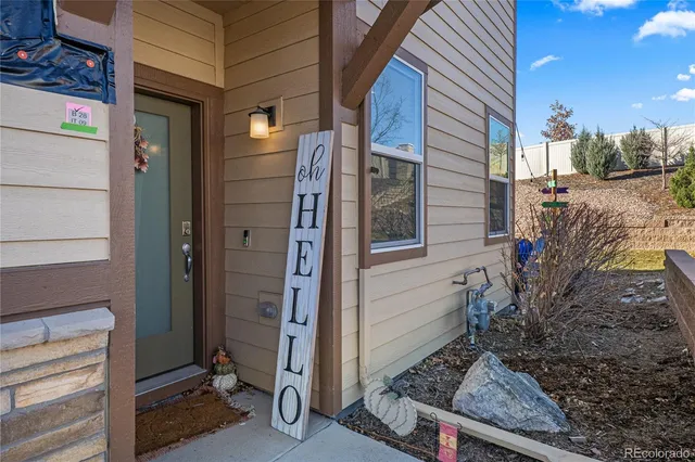 a view of a house with a door and chair