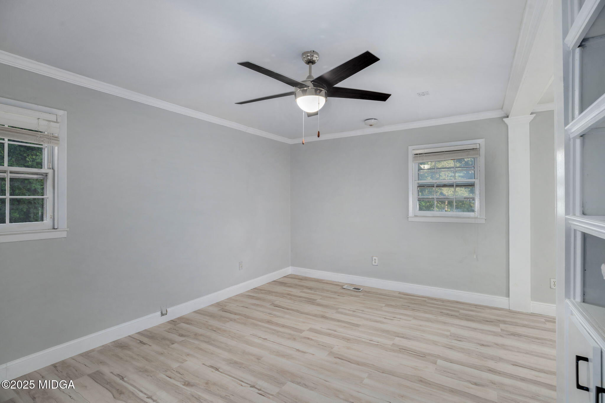 113 Colonial Road Warner Robins, GA 31088 - Photo 15 of 34 a view of empty room with wooden floor