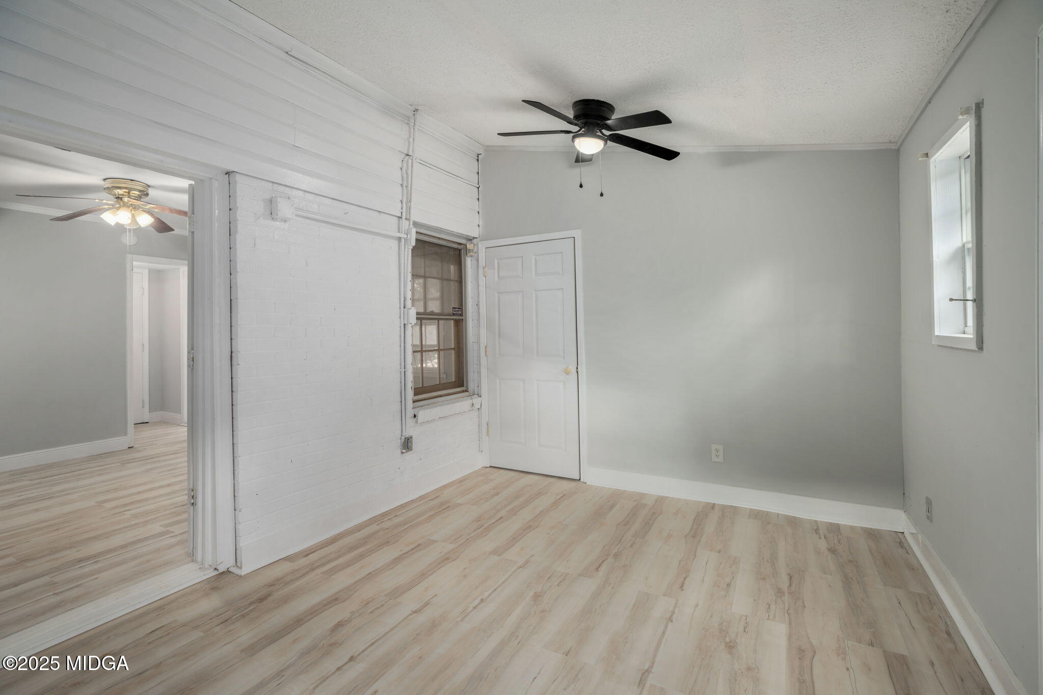 113 Colonial Road Warner Robins, GA 31088 - Photo 28 of 34 a view of empty room with wooden floor
