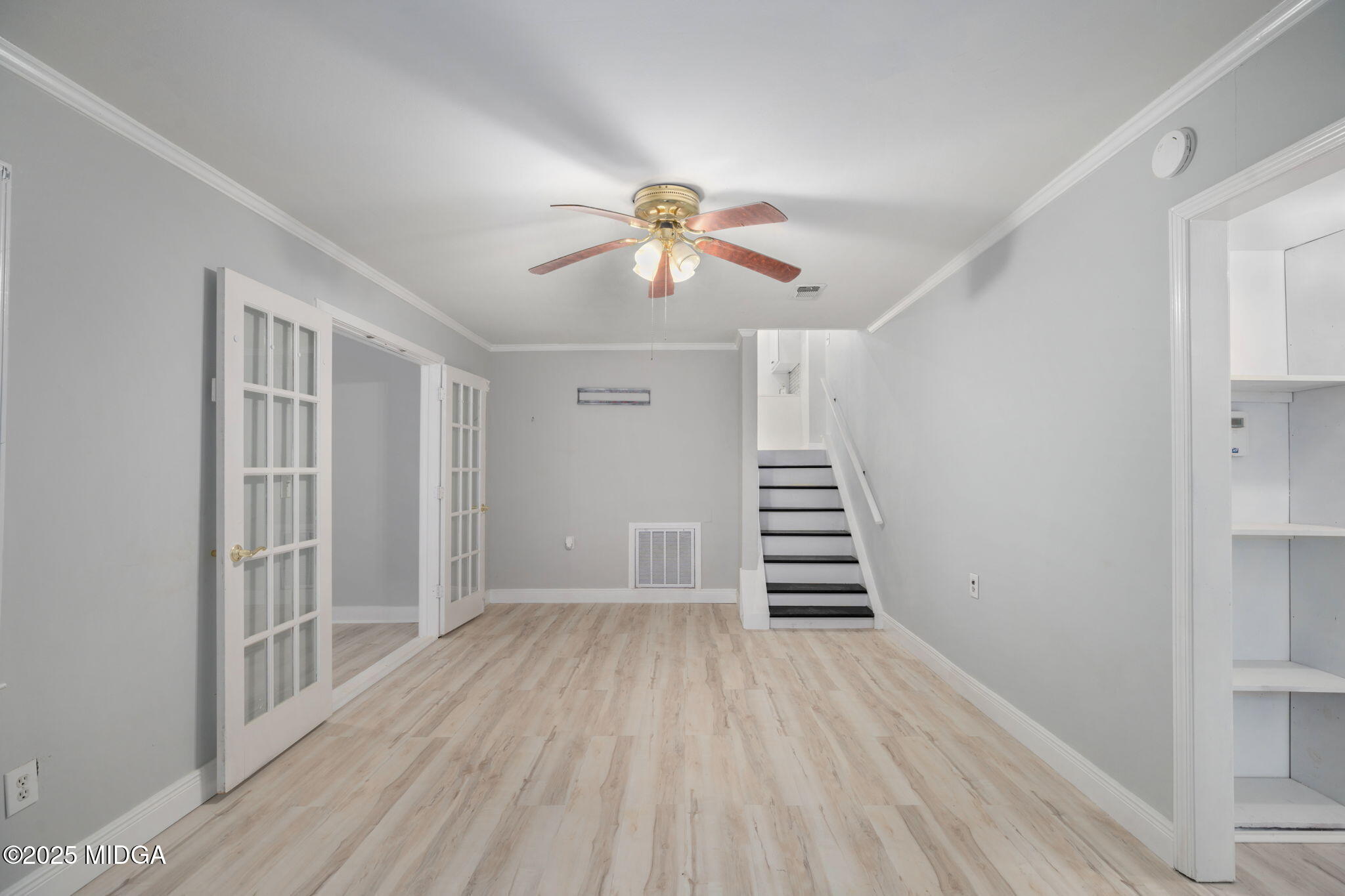 113 Colonial Road Warner Robins, GA 31088 - Photo 30 of 34 wooden floor in an empty room with a window