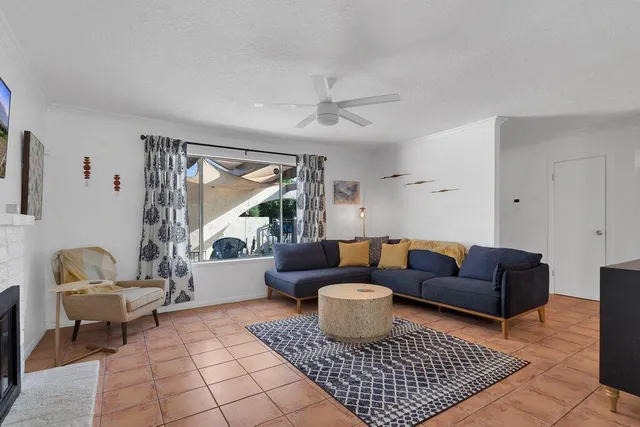 a bathroom with a sink toilet and mirror