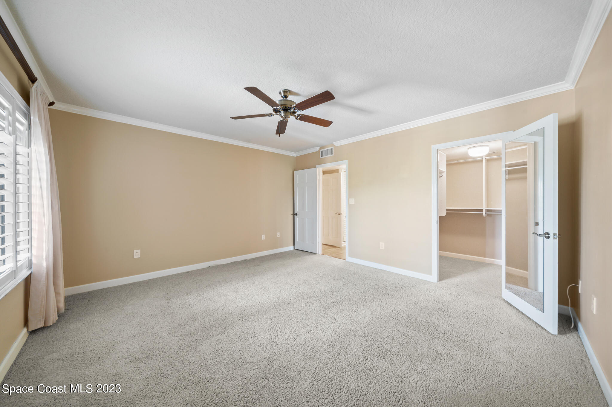 2220 Front Street, Unit 303 Melbourne, FL 32901 - Photo 11 of 24 a view of an empty room with a window