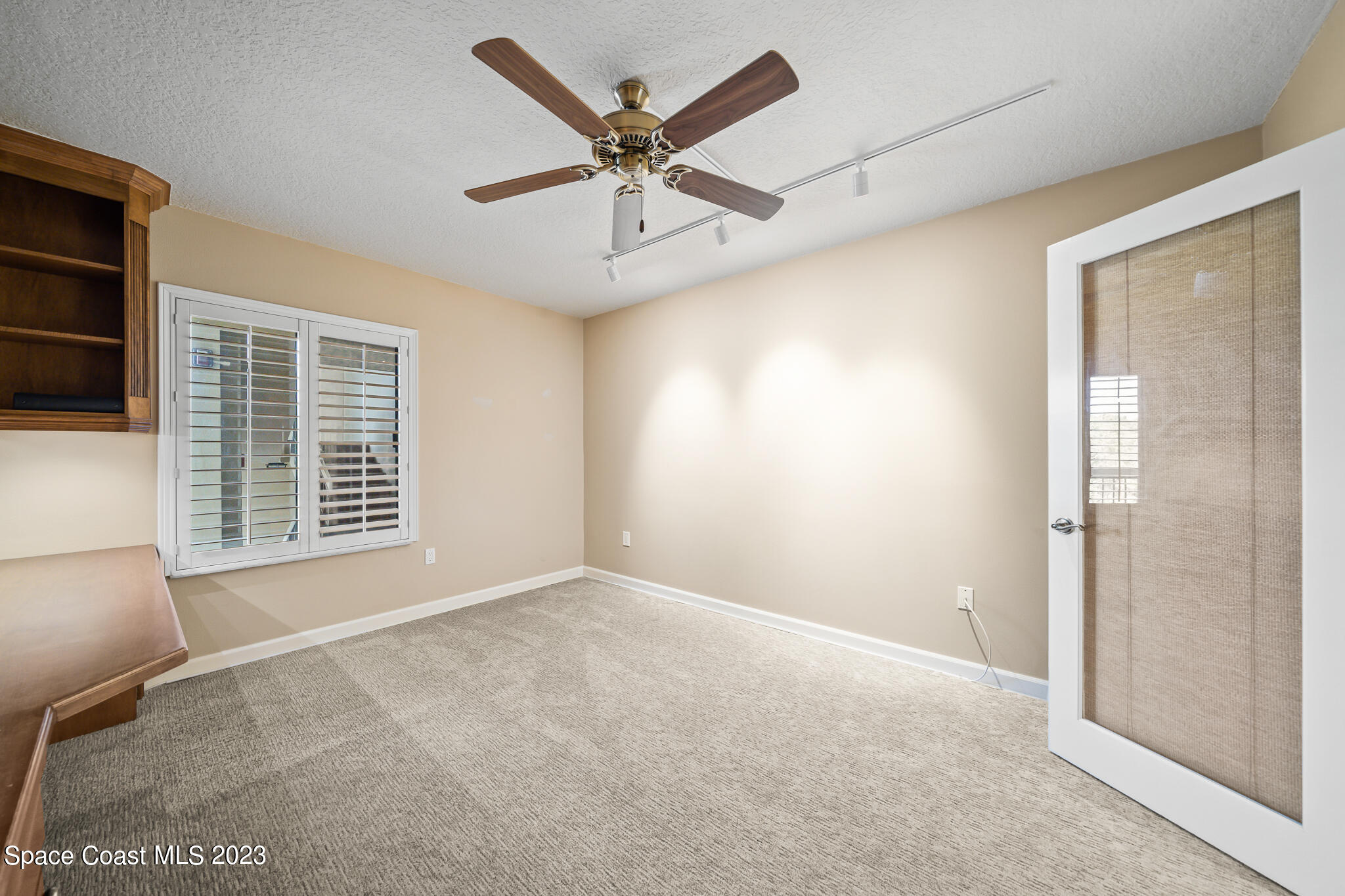 2220 Front Street, Unit 303 Melbourne, FL 32901 - Photo 15 of 24 a view of an empty room with a window