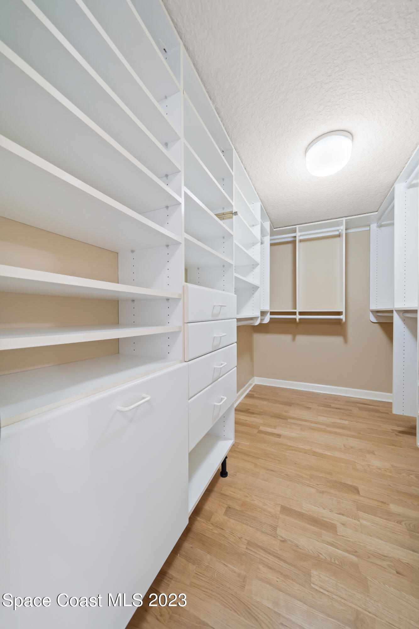 2220 Front Street, Unit 303 Melbourne, FL 32901 - Photo 19 of 24 a view of an empty walk in closet