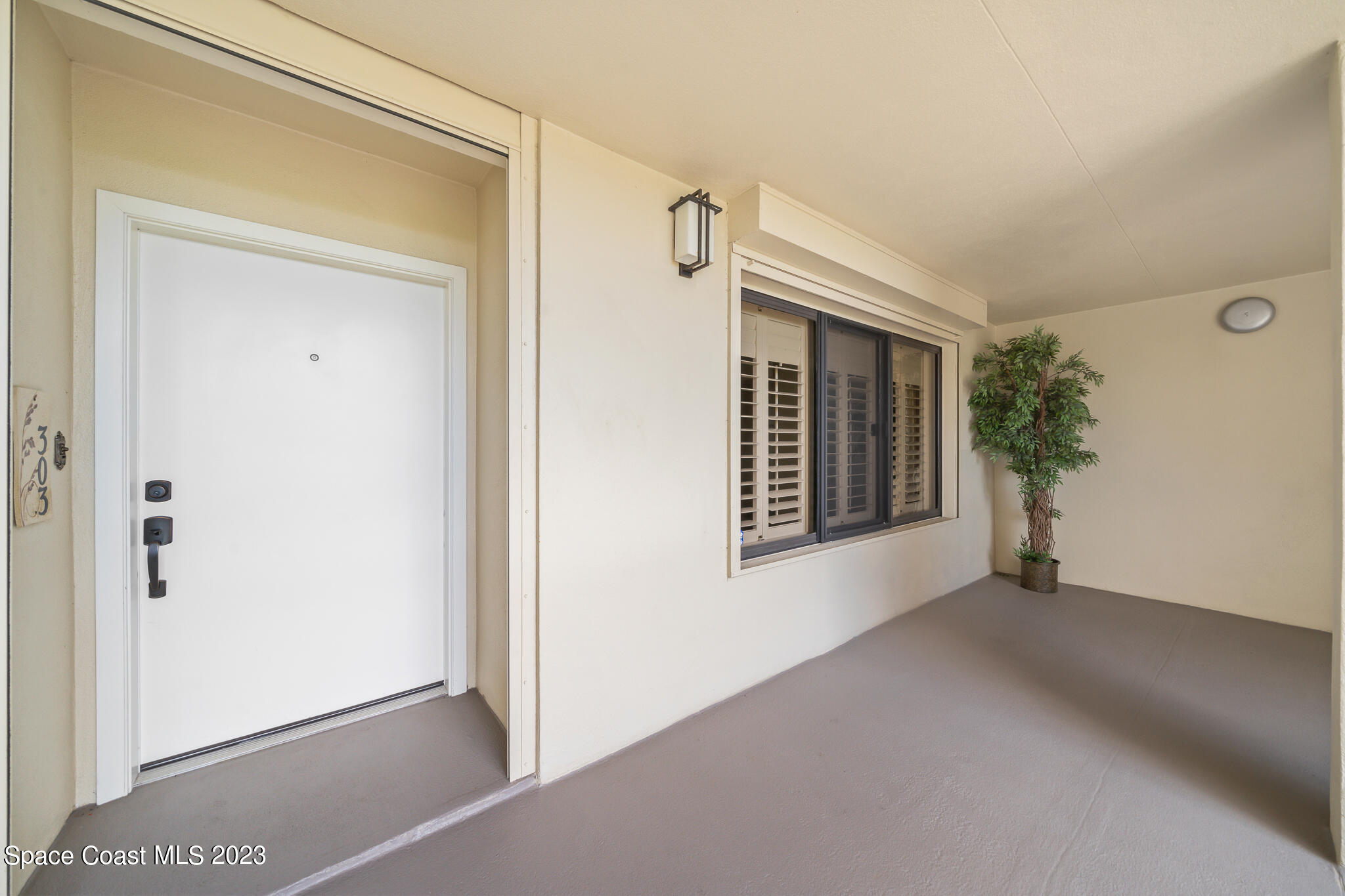 2220 Front Street, Unit 303 Melbourne, FL 32901 - Photo 24 of 24 a view of a room that has a window in it