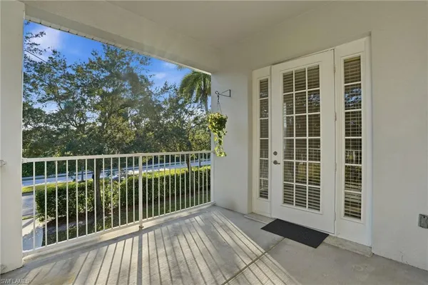 a view of a balcony with a swing