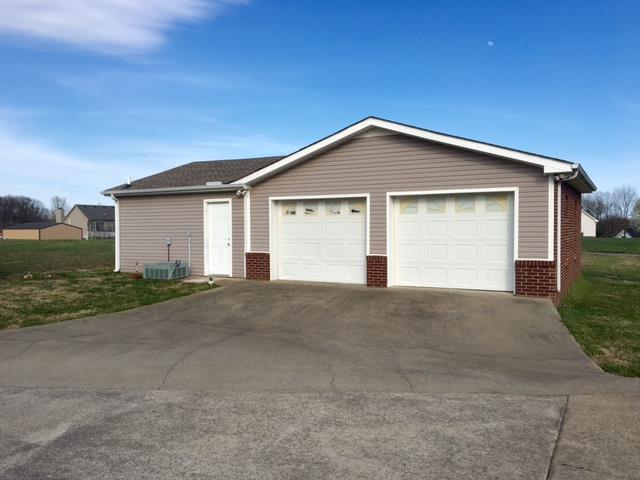 208 Independence Street Springfield, TN 37172 - Photo 22 of 22 a view of garage and yard