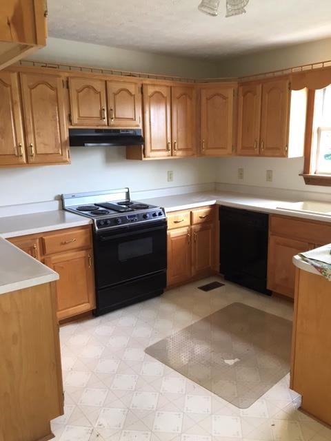 208 Independence Street Springfield, TN 37172 - Photo 8 of 22 a kitchen with stainless steel appliances granite countertop a stove a sink dishwasher and a refrigerator