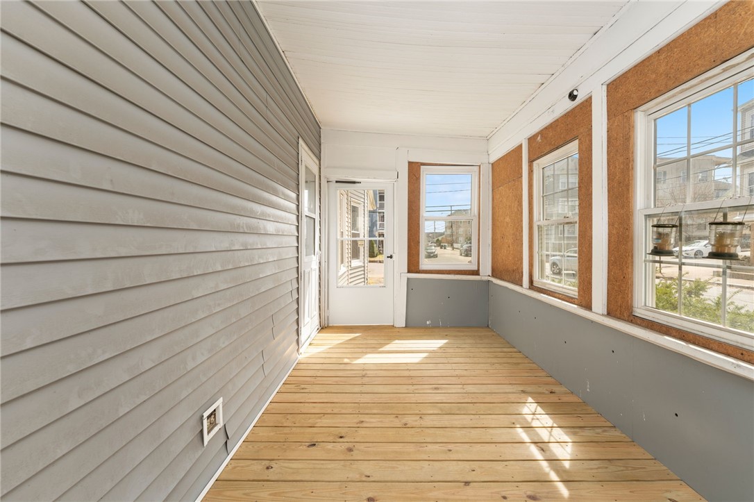 460 Elm Street Woonsocket, RI 02895 - Photo 11 of 42 NEWLY RENOVATED SIDE PORCH OFF KITCHEN