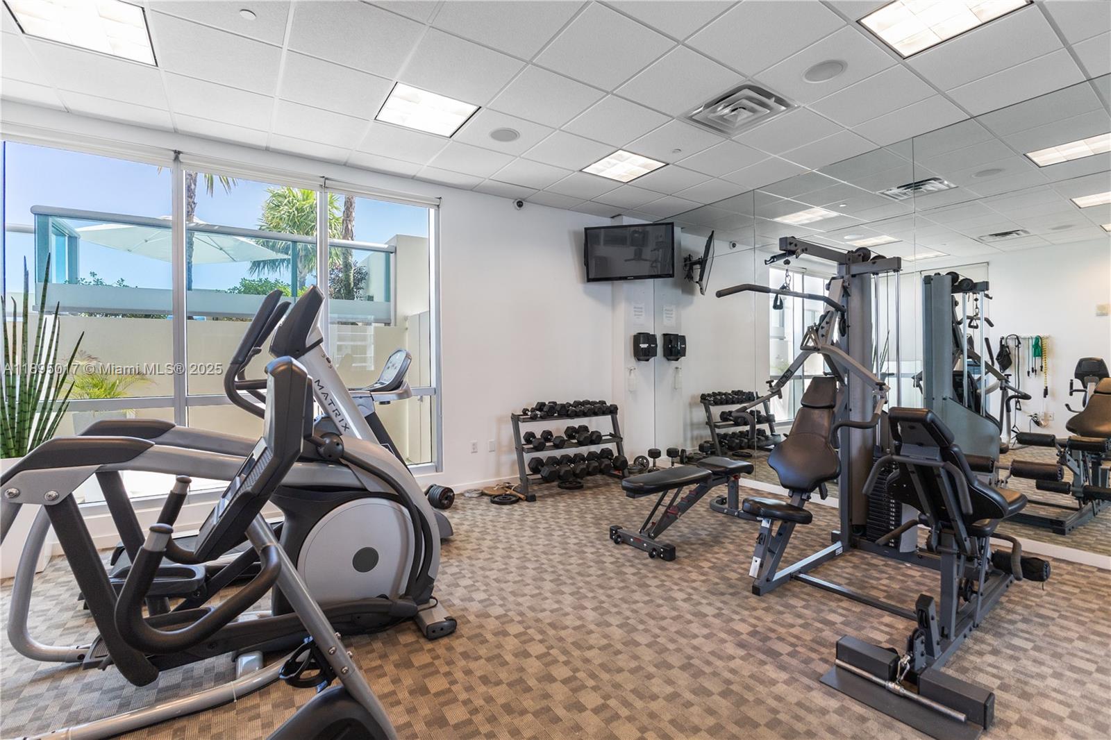 7935 East Drive, Unit 803 Miami Beach, FL 33141 - Photo 34 of 77 a view of a room with gym equipment