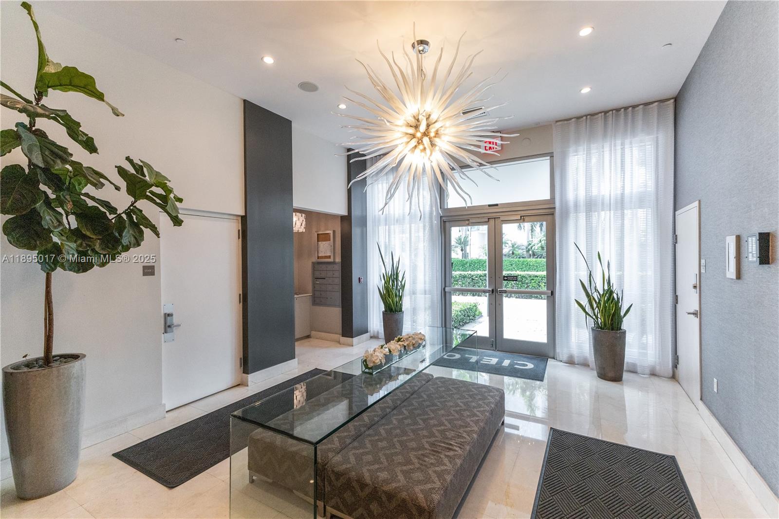 7935 East Drive, Unit 803 Miami Beach, FL 33141 - Photo 36 of 77 a living room with furniture and a large window