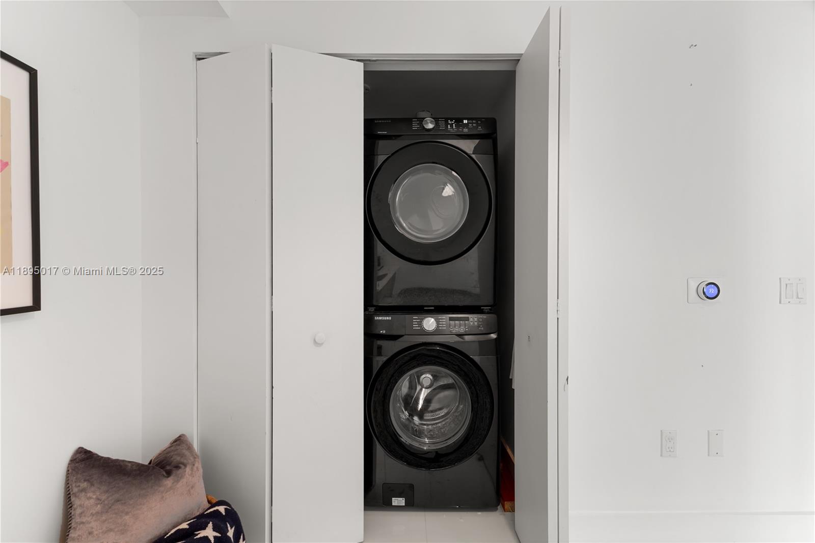 7935 East Drive, Unit 803 Miami Beach, FL 33141 - Photo 67 of 77 a view of washer and dryer in a utility room