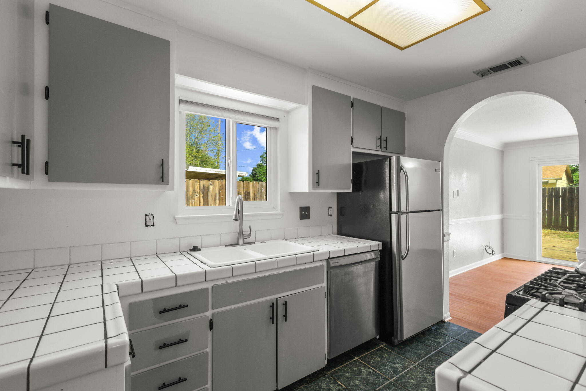 3985 Cirrus Street Redding, CA 96002 - Photo 11 of 27 a kitchen with a sink appliances and cabinets