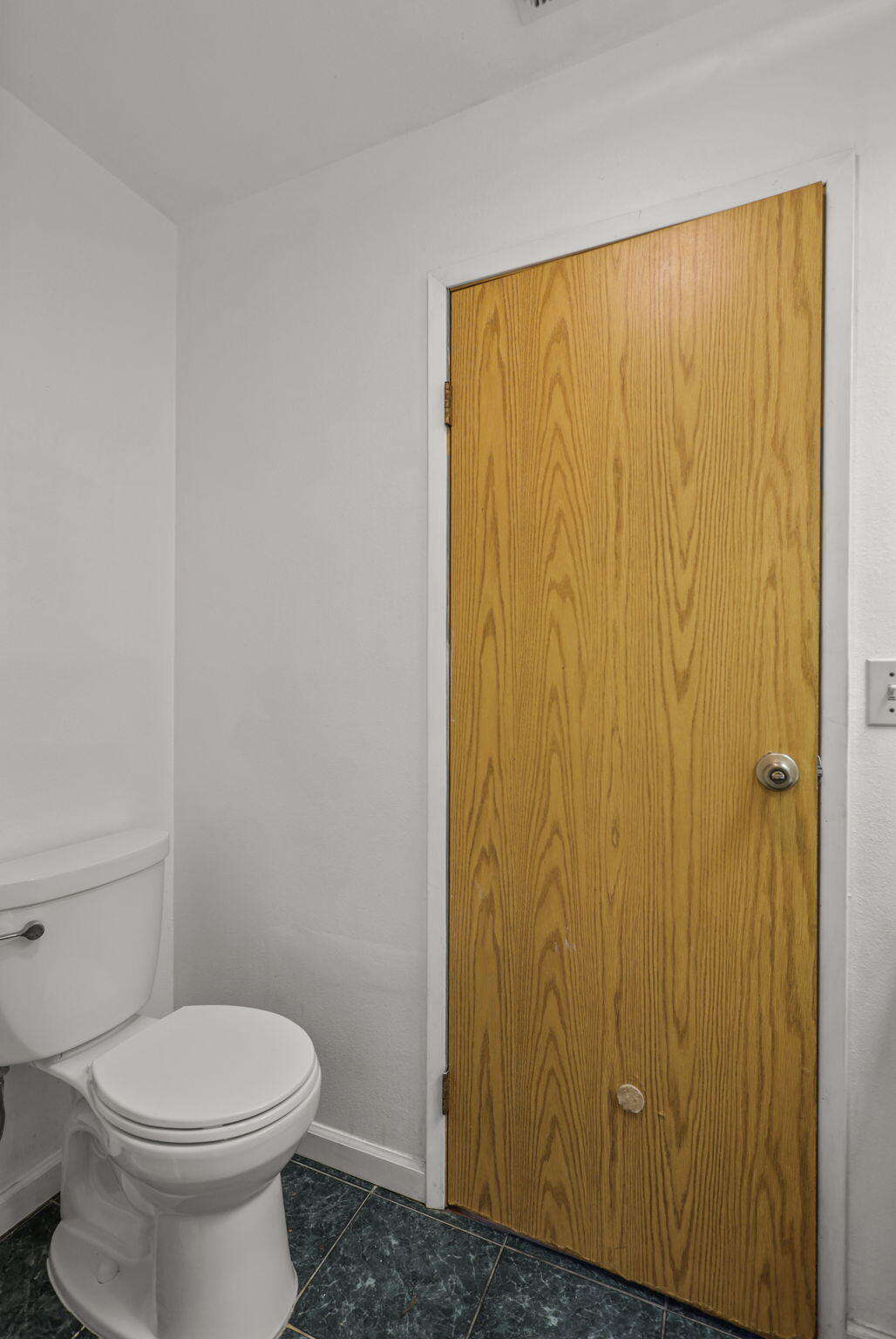 3985 Cirrus Street Redding, CA 96002 - Photo 20 of 27 a bathroom with a granite countertop toilet and a sink