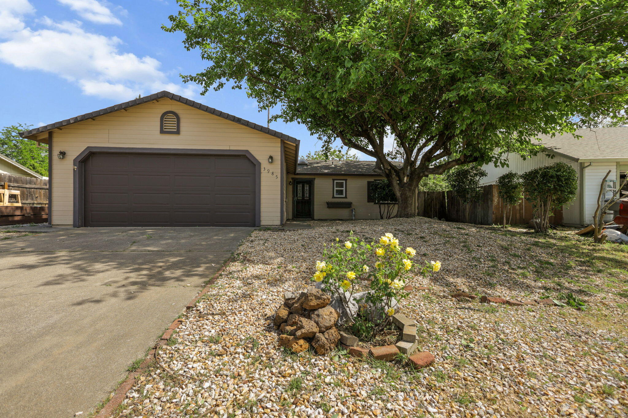 3985 Cirrus Street Redding, CA 96002 - Photo 26 of 27 a front view of a house with a yard