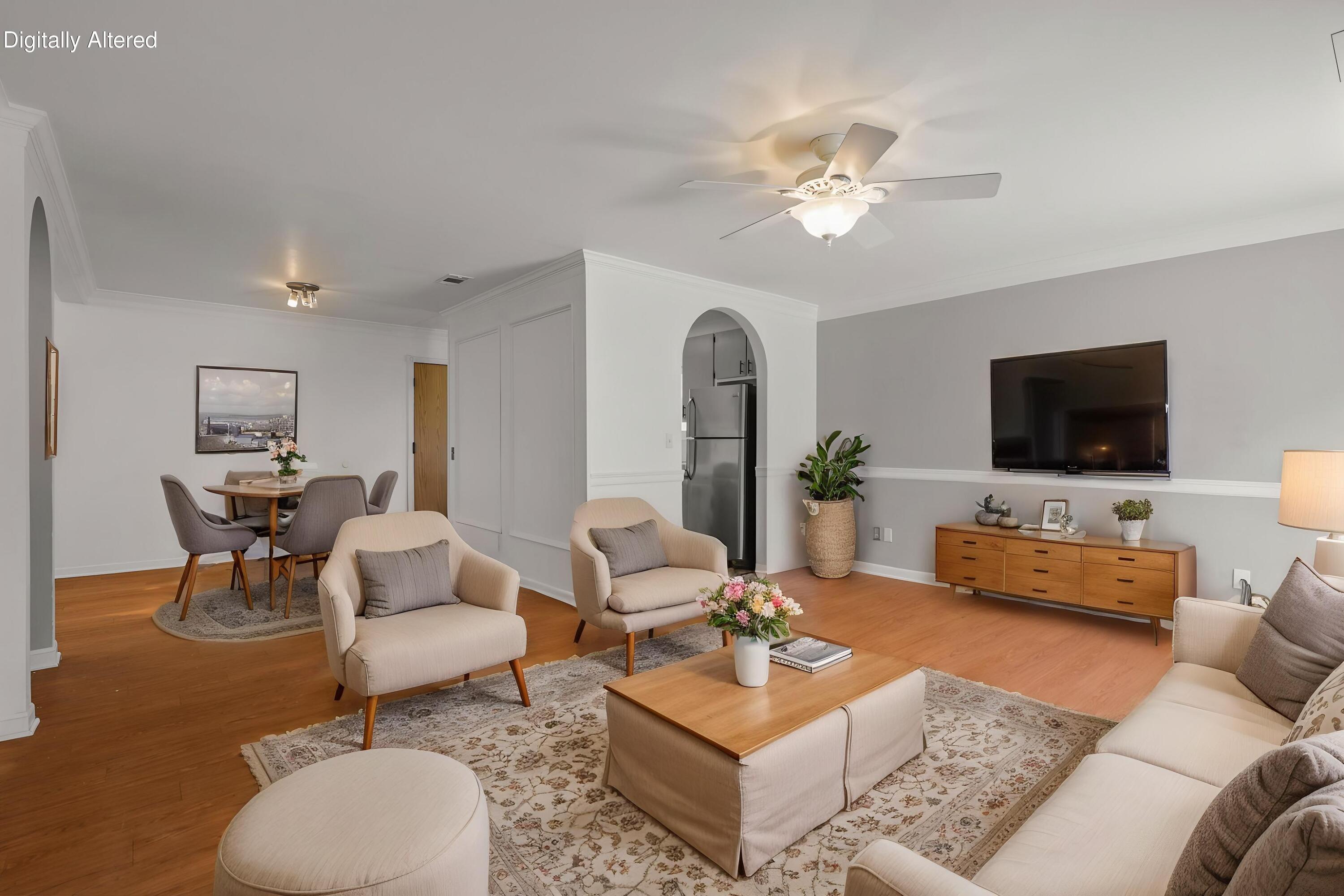 3985 Cirrus Street Redding, CA 96002 - Photo 3 of 27 a living room with furniture a flat screen tv and a chandelier