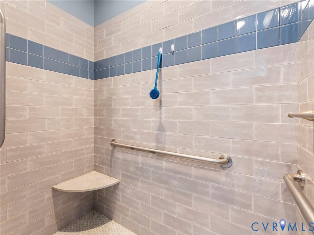 11390 Rocky Ridge Road Glen Allen, VA 23059 - Photo 63 of 82 Tiled shower stall featuring light-toned rectangul