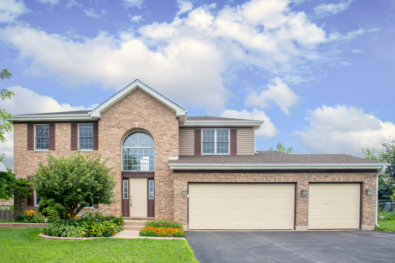 2809 Weld Road Elgin, IL 60124 - Photo 1 of 28 a front view of a house with garden
