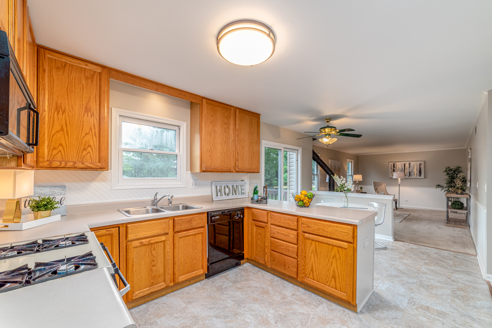 2809 Weld Road Elgin, IL 60124 - Photo 2 of 28 a kitchen with a sink stove and cabinets