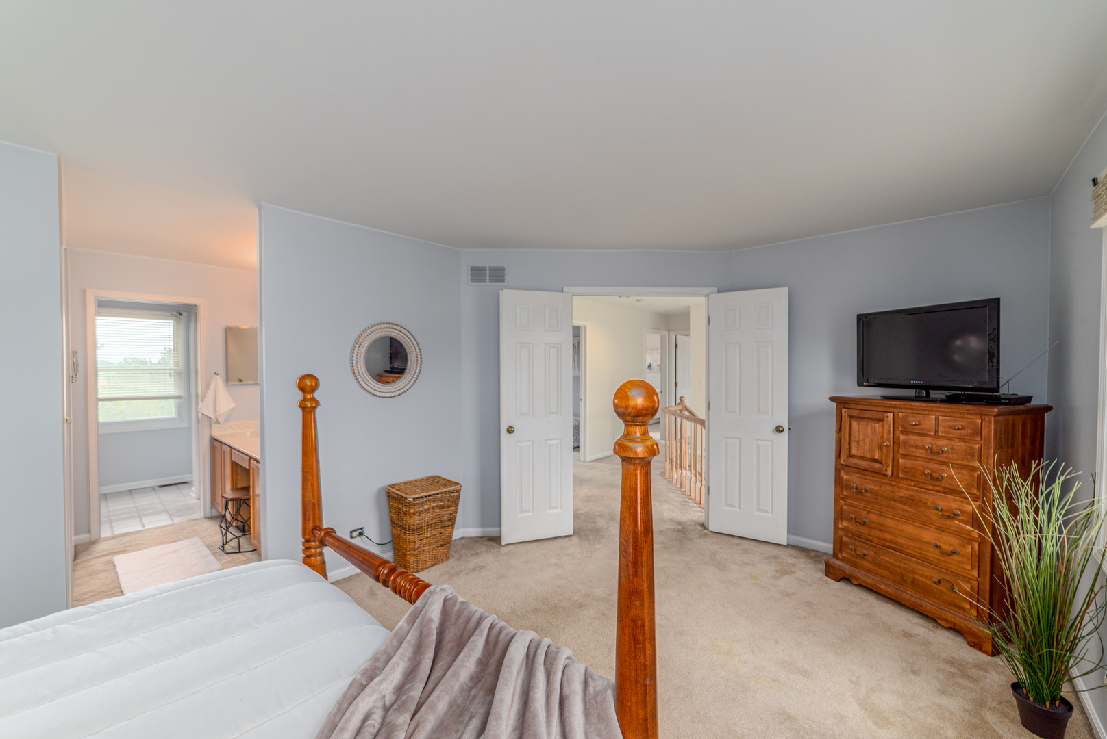 2809 Weld Road Elgin, IL 60124 - Photo 17 of 28 a bedroom with furniture and a flat screen tv