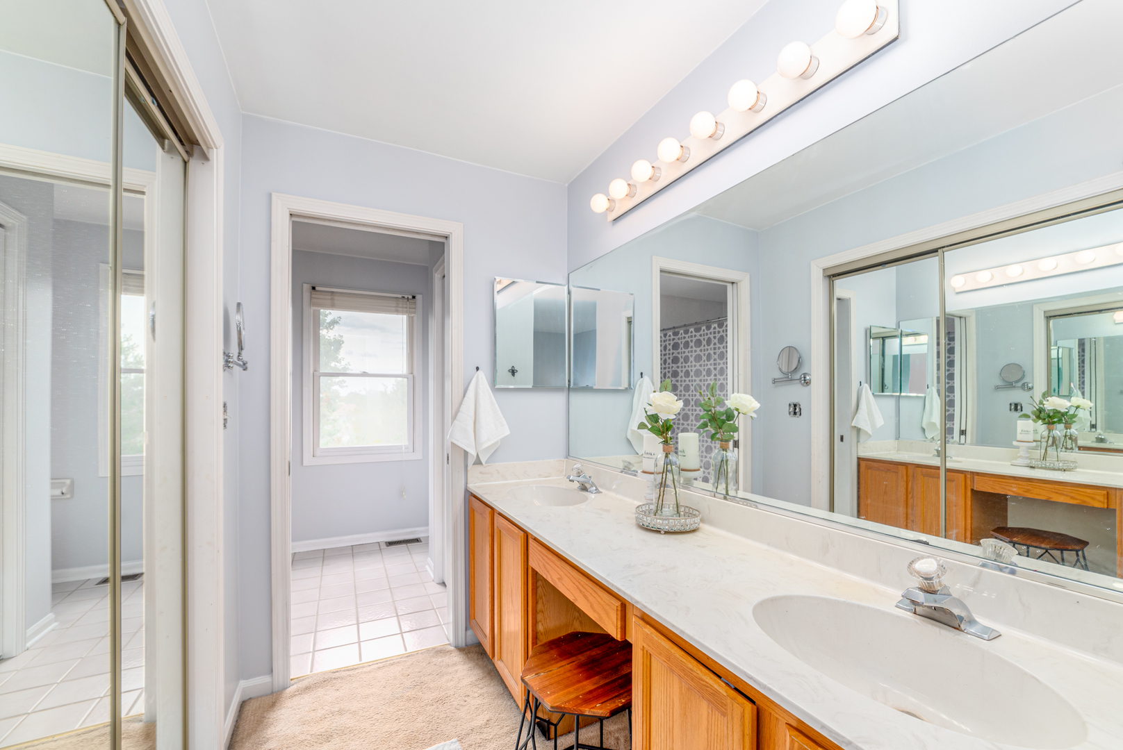2809 Weld Road Elgin, IL 60124 - Photo 18 of 28 a bathroom with a sink double vanity and a mirror