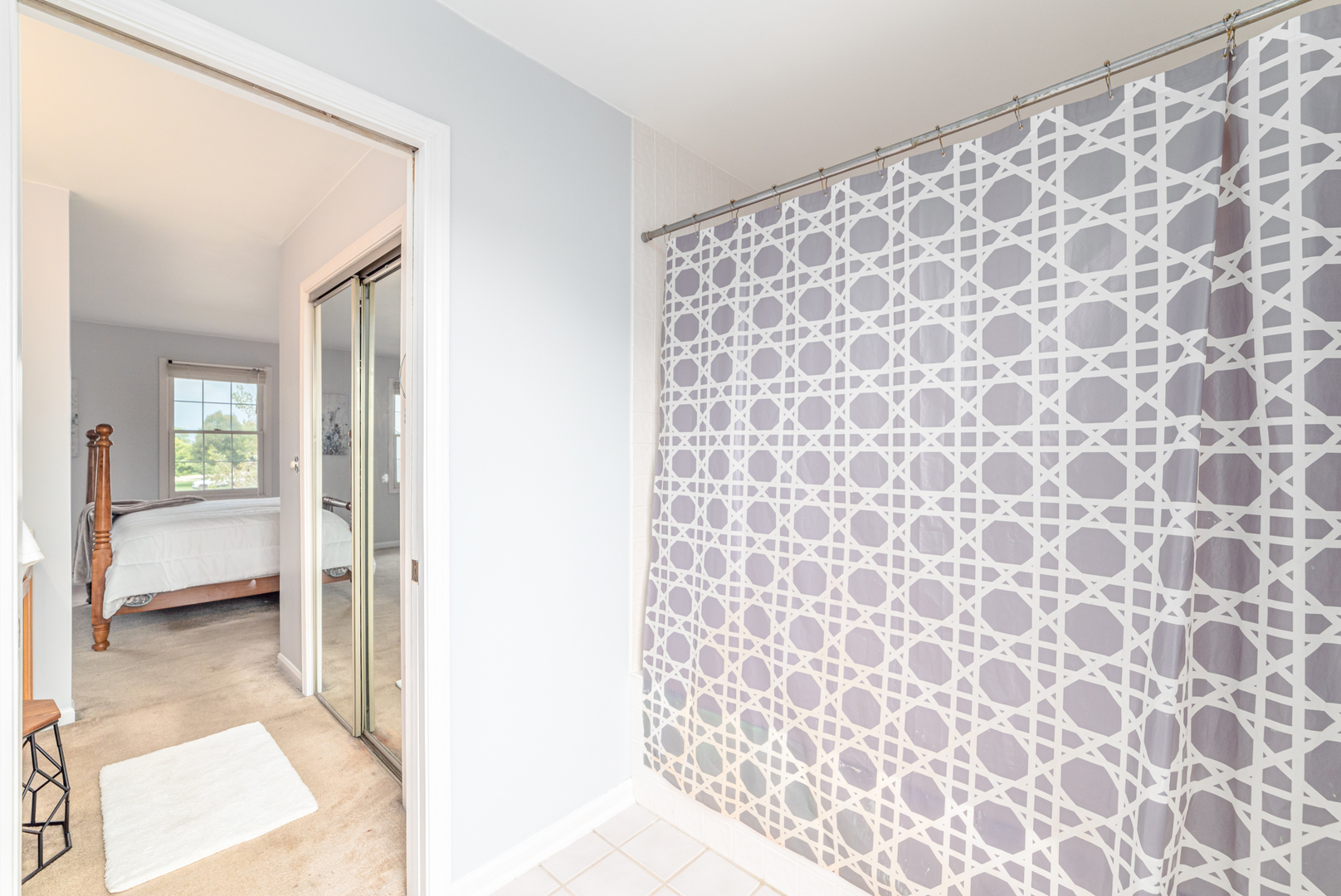 2809 Weld Road Elgin, IL 60124 - Photo 19 of 28 a bathroom with a bathtub and a shower