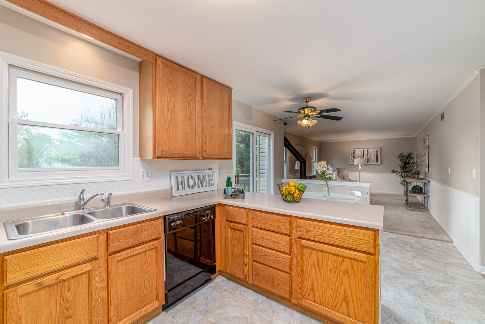 2809 Weld Road Elgin, IL 60124 - Photo 6 of 28 a kitchen with stainless steel appliances granite countertop sink stove and cabinets