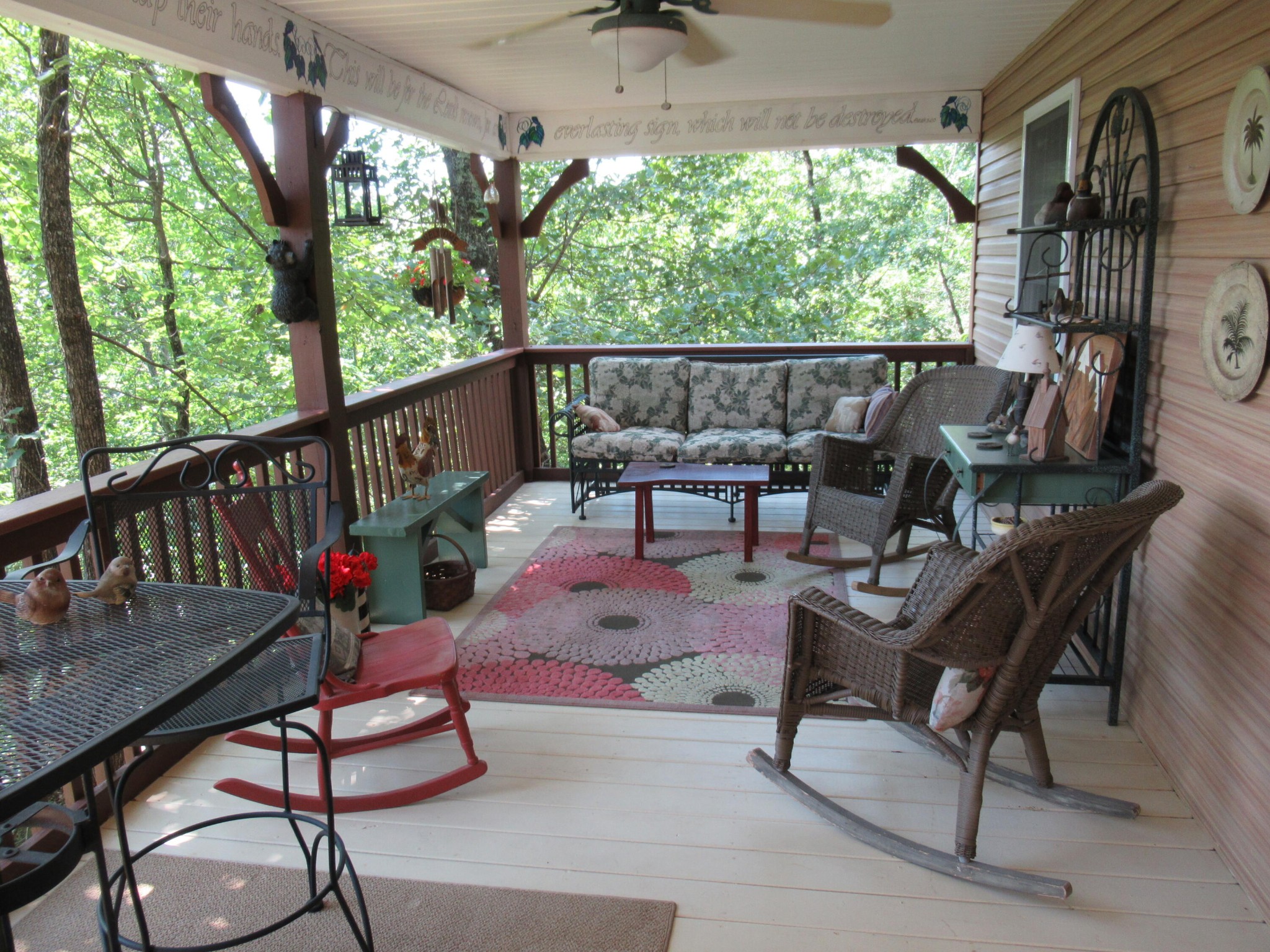 260 Deer Ridge Trail Ocoee, TN 37361 - Photo 24 of 72 a view of a porch with furniture and a yard