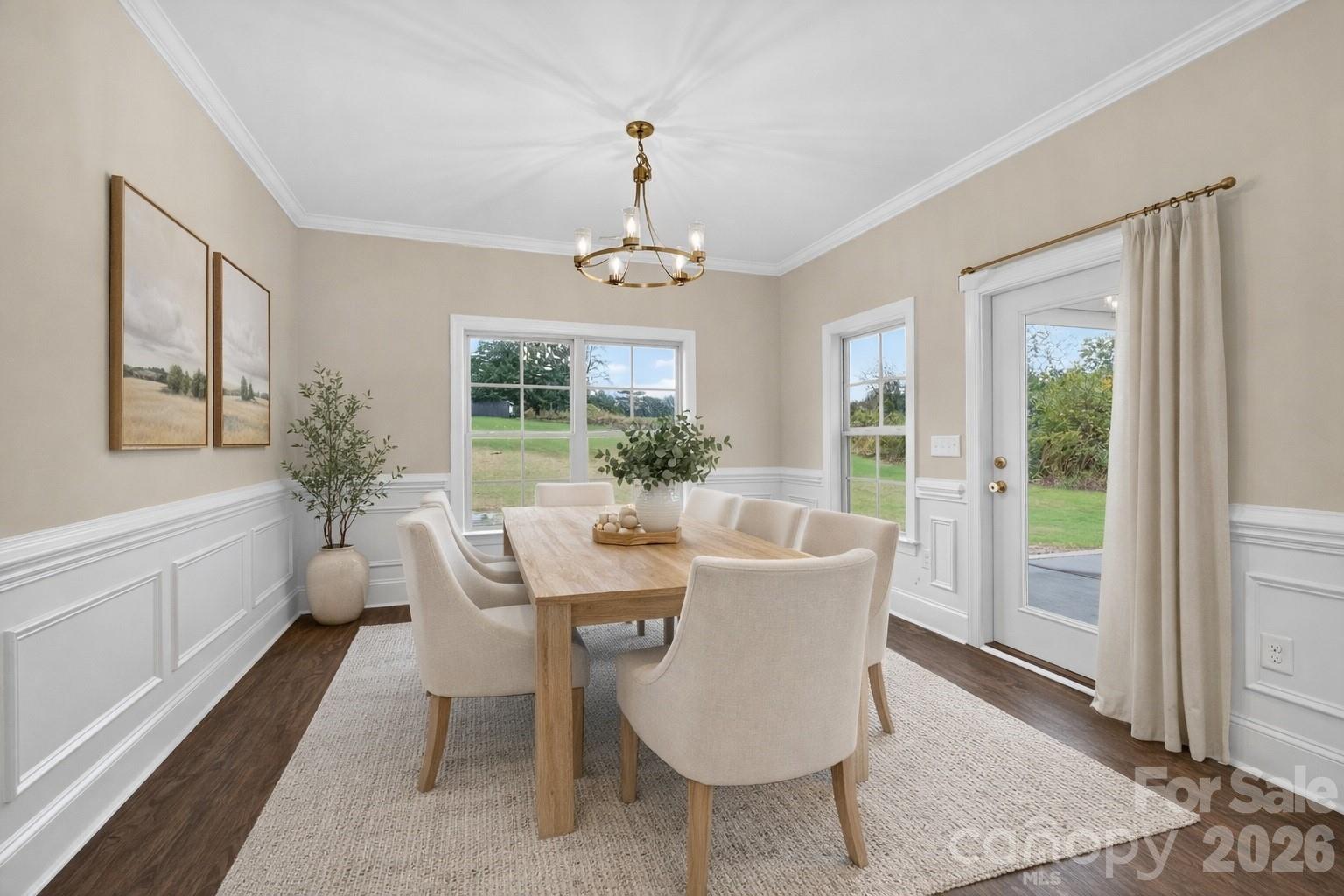 3030 Buffett Lane, Unit 49 Monroe, NC 28110 - Photo 13 of 31 a view of a dining room with furniture window and wooden floor