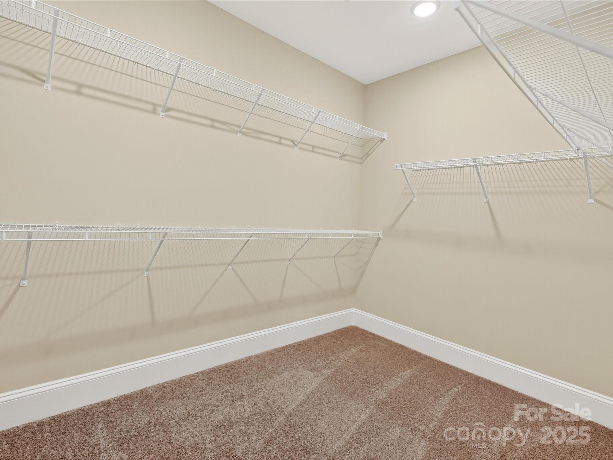 3030 Buffett Lane, Unit 49 Monroe, NC 28110 - Photo 17 of 27 a view of a room with racks on the wall