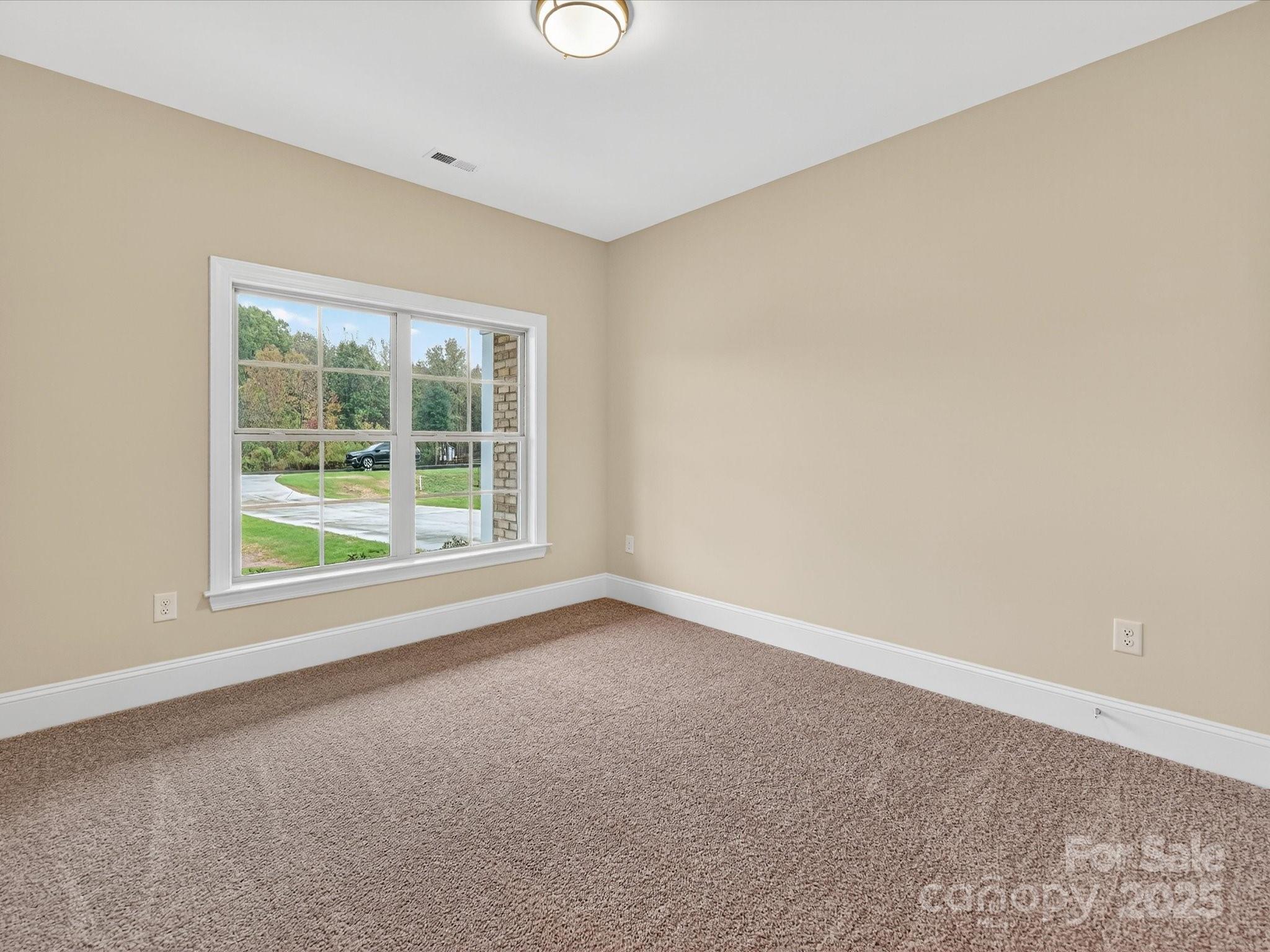 3030 Buffett Lane, Unit 49 Monroe, NC 28110 - Photo 18 of 27 an empty room with a window
