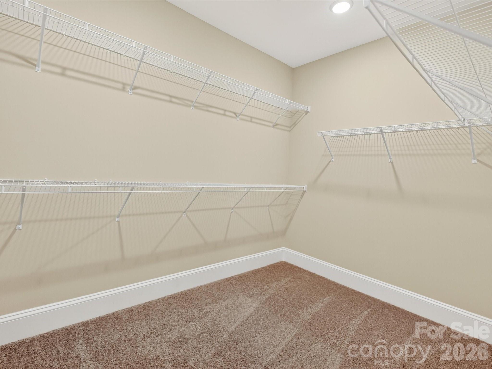 3030 Buffett Lane, Unit 49 Monroe, NC 28110 - Photo 20 of 31 a view of a room with racks on the wall