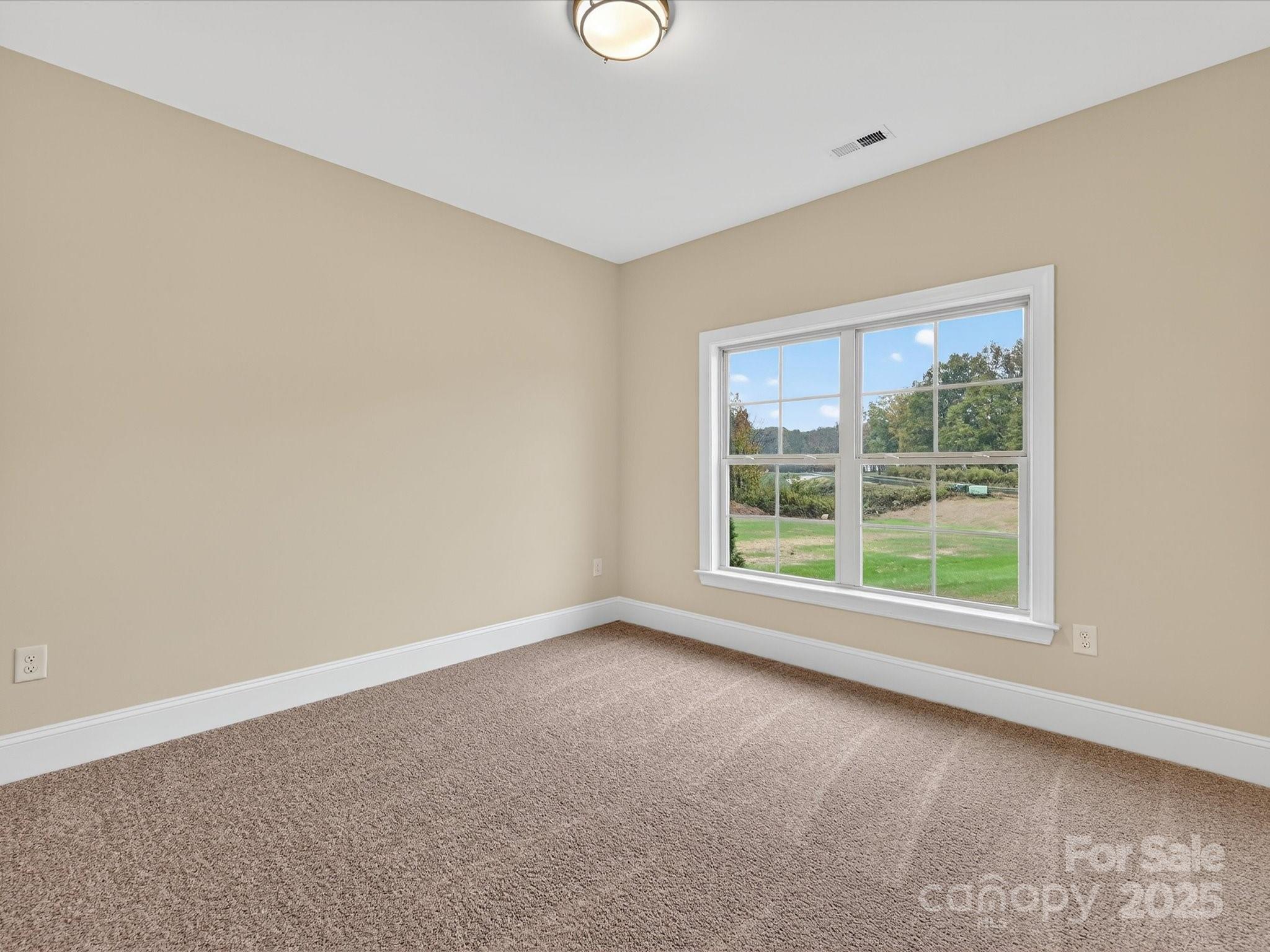 3030 Buffett Lane, Unit 49 Monroe, NC 28110 - Photo 20 of 27 an empty room with a window