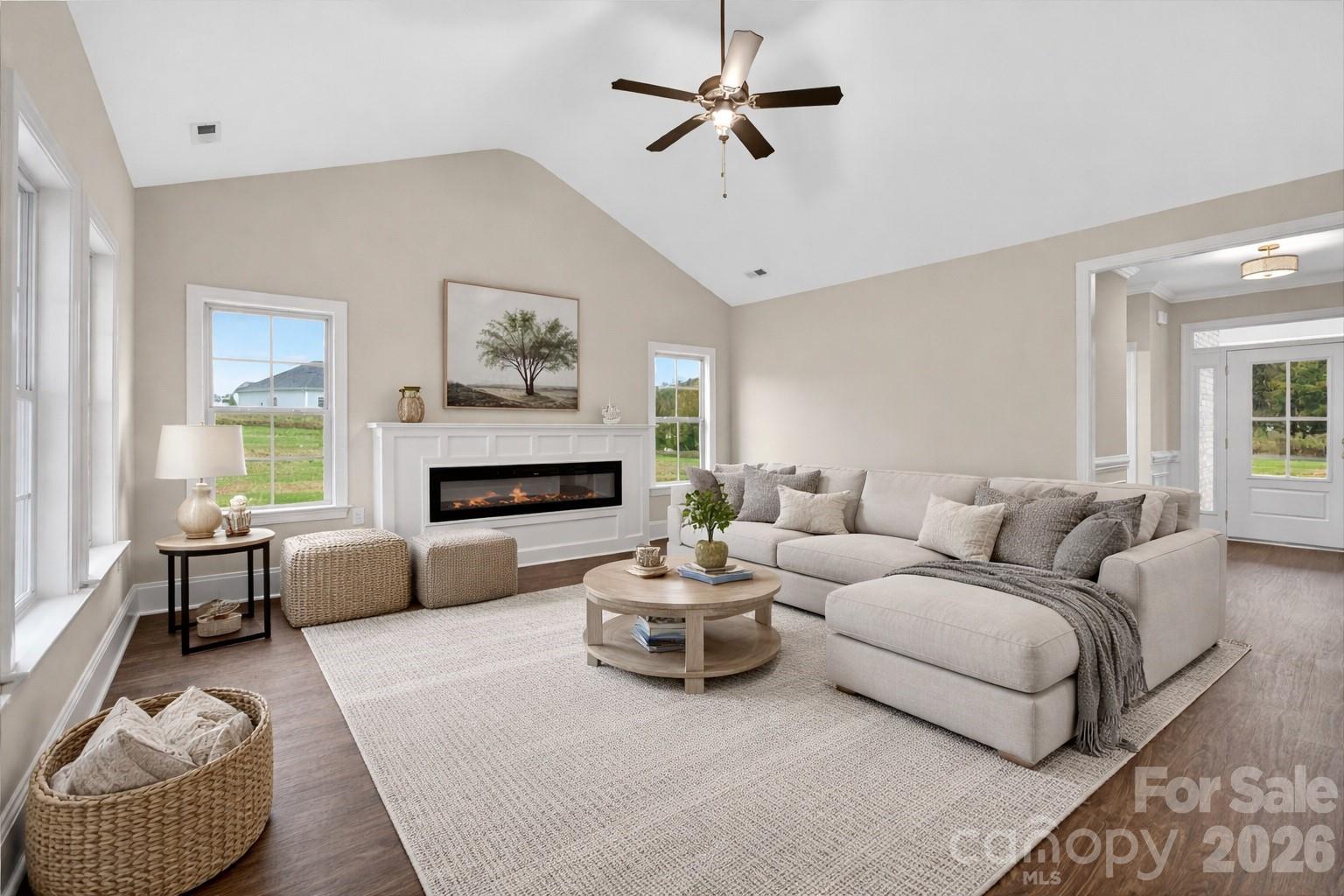 3030 Buffett Lane, Unit 49 Monroe, NC 28110 - Photo 2 of 31 a living room with furniture and a fireplace