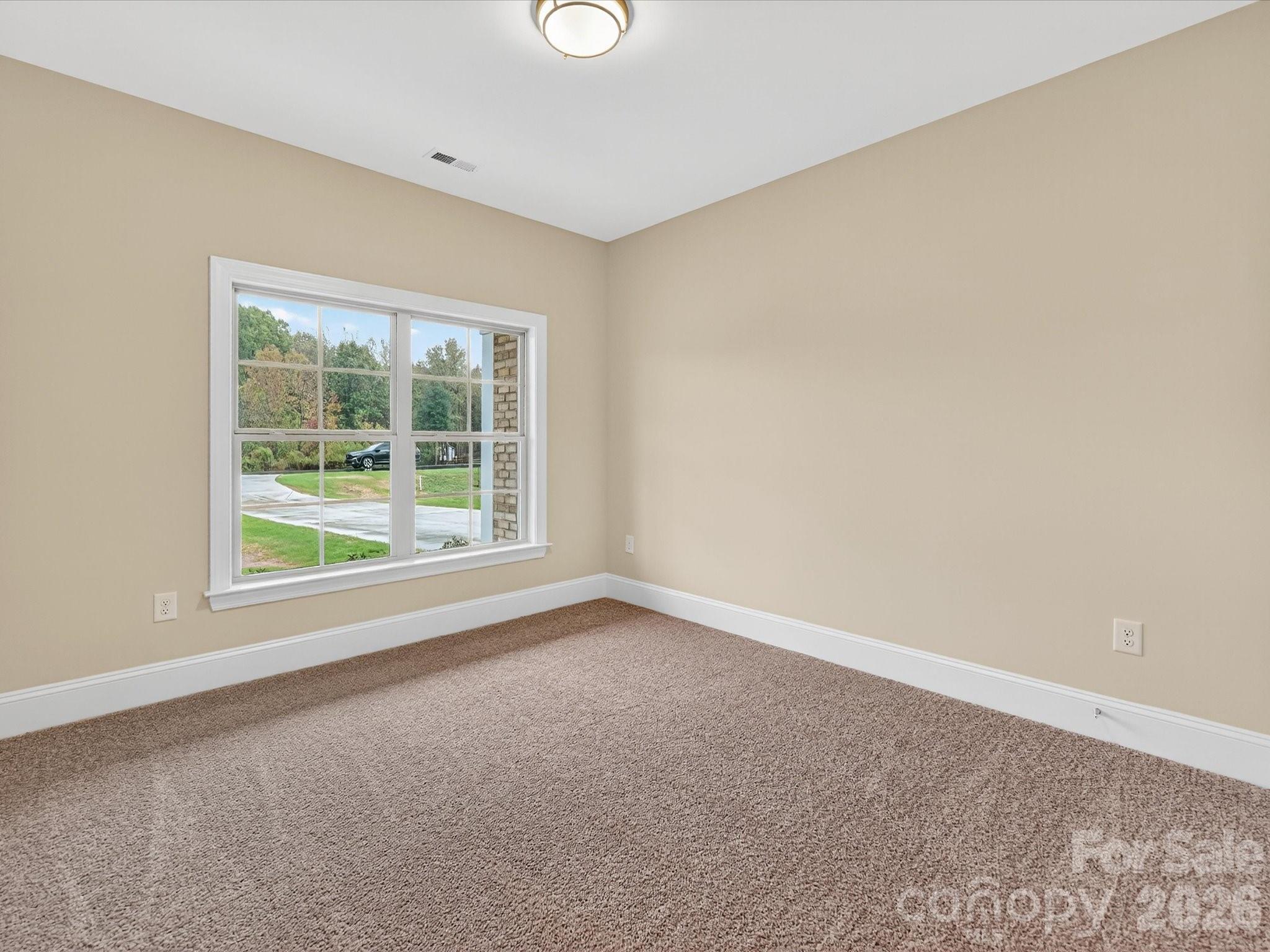 3030 Buffett Lane, Unit 49 Monroe, NC 28110 - Photo 21 of 31 an empty room with a window