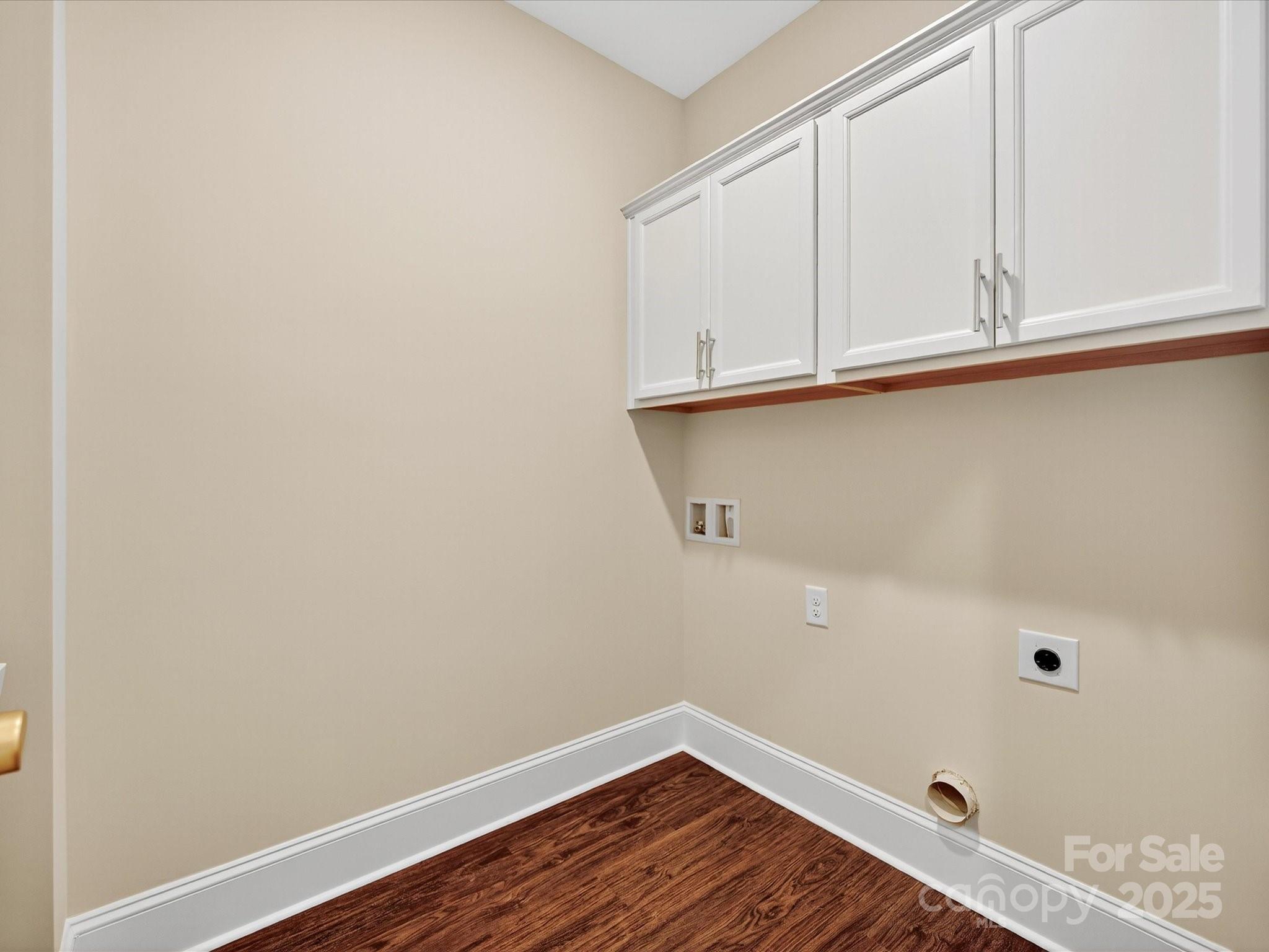 3030 Buffett Lane, Unit 49 Monroe, NC 28110 - Photo 22 of 27 a view of a closet with wooden floor