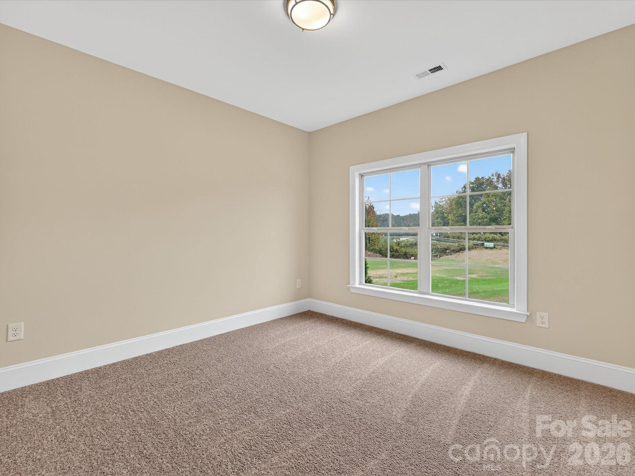 3030 Buffett Lane, Unit 49 Monroe, NC 28110 - Photo 23 of 31 an empty room with a window