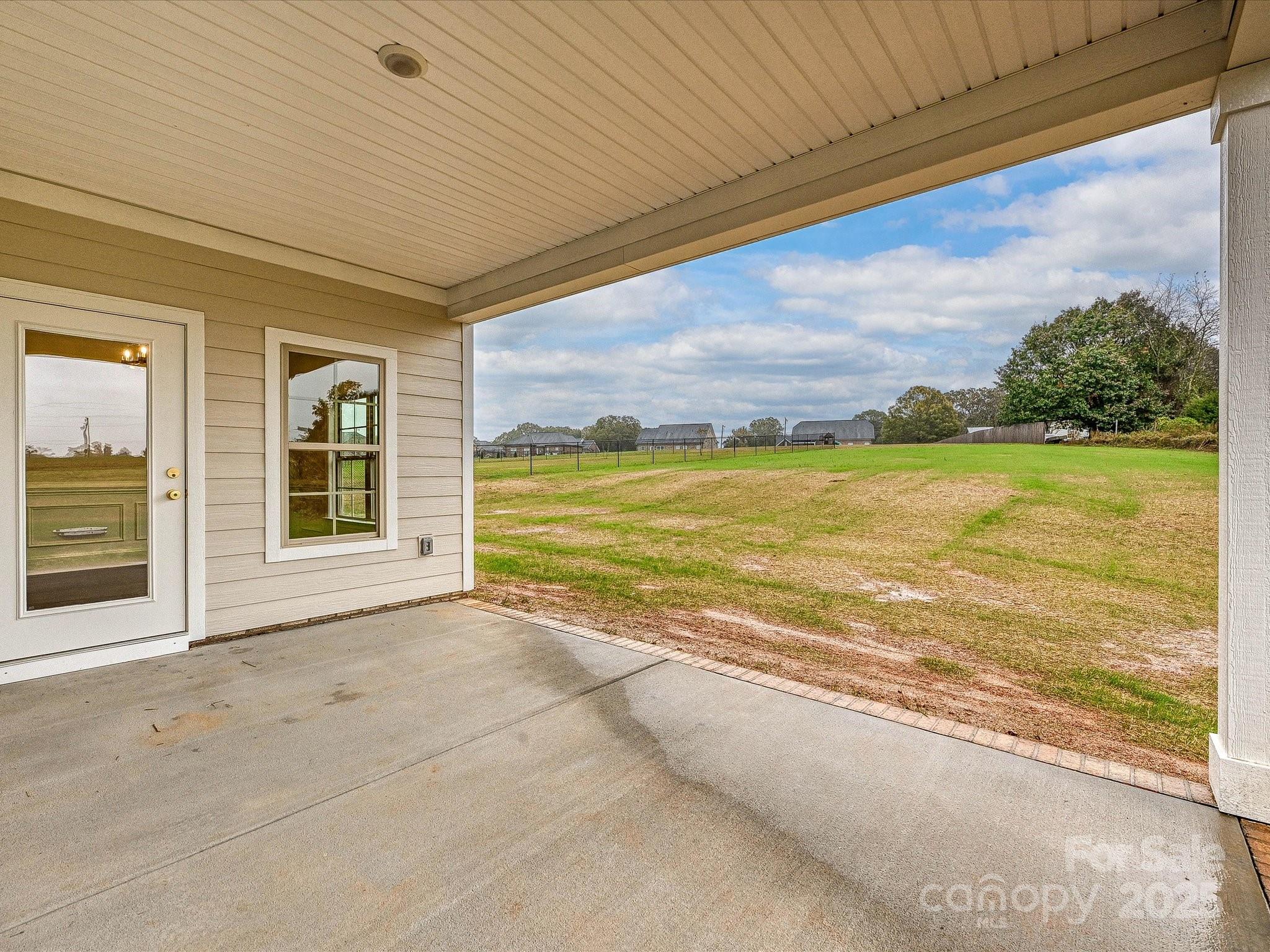3030 Buffett Lane, Unit 49 Monroe, NC 28110 - Photo 24 of 27 a view of an ocean and a mountain