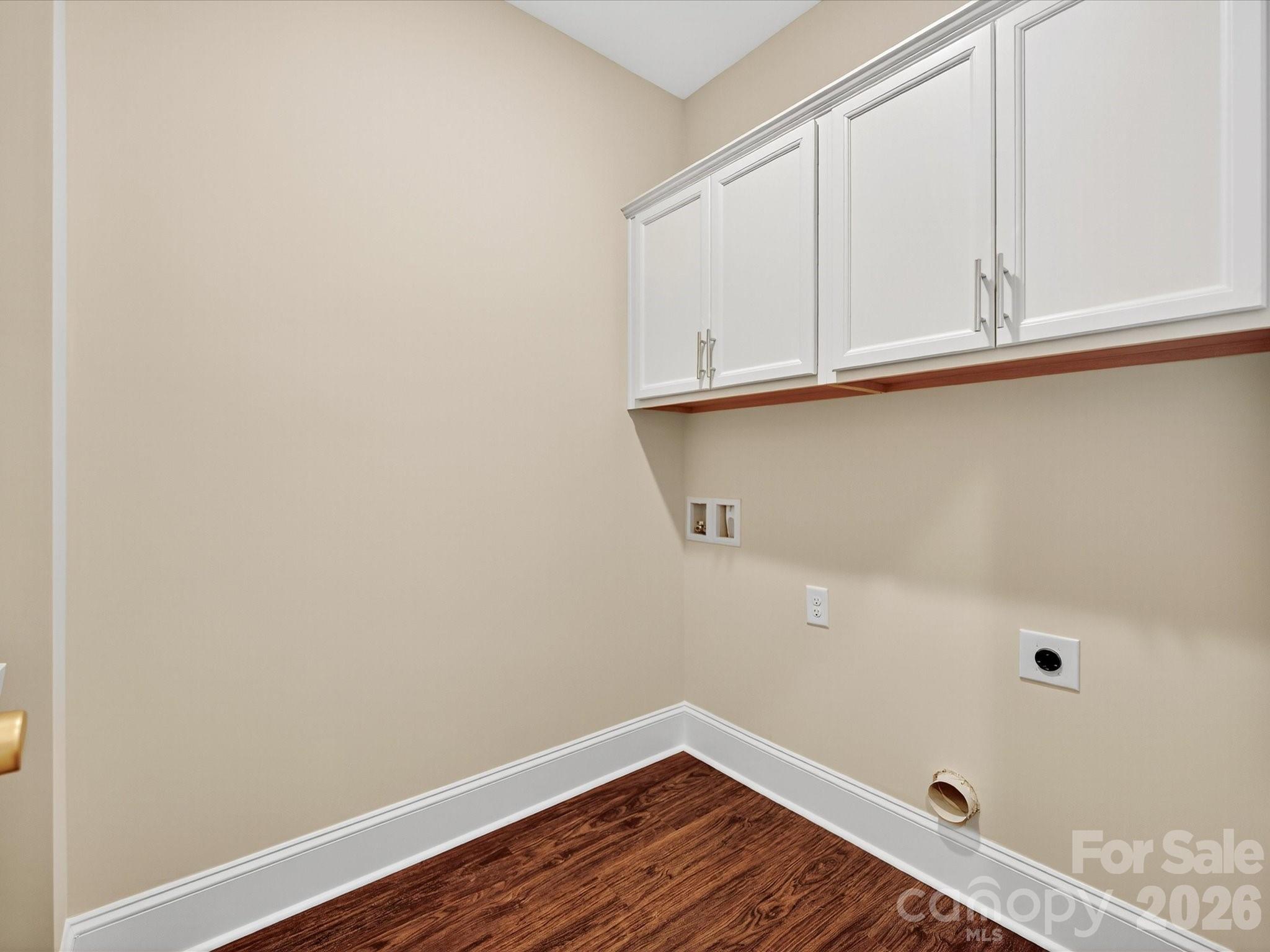 3030 Buffett Lane, Unit 49 Monroe, NC 28110 - Photo 25 of 31 a view of a closet with wooden floor