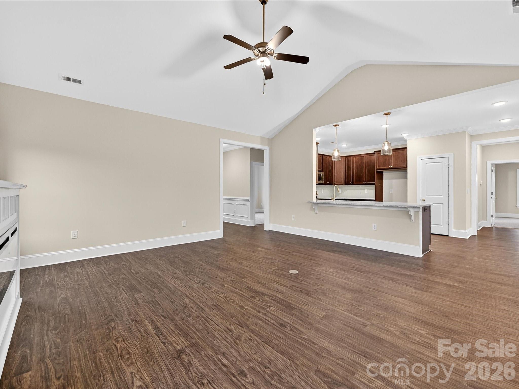 3030 Buffett Lane, Unit 49 Monroe, NC 28110 - Photo 7 of 31 a view of an empty room with a kitchen