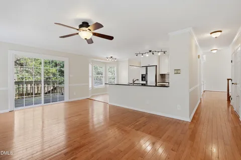 a kitchen with stainless steel appliances a stove a sink and a refrigerator